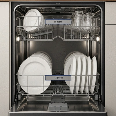 Modern Bosch dishwasher interior with clean dishes